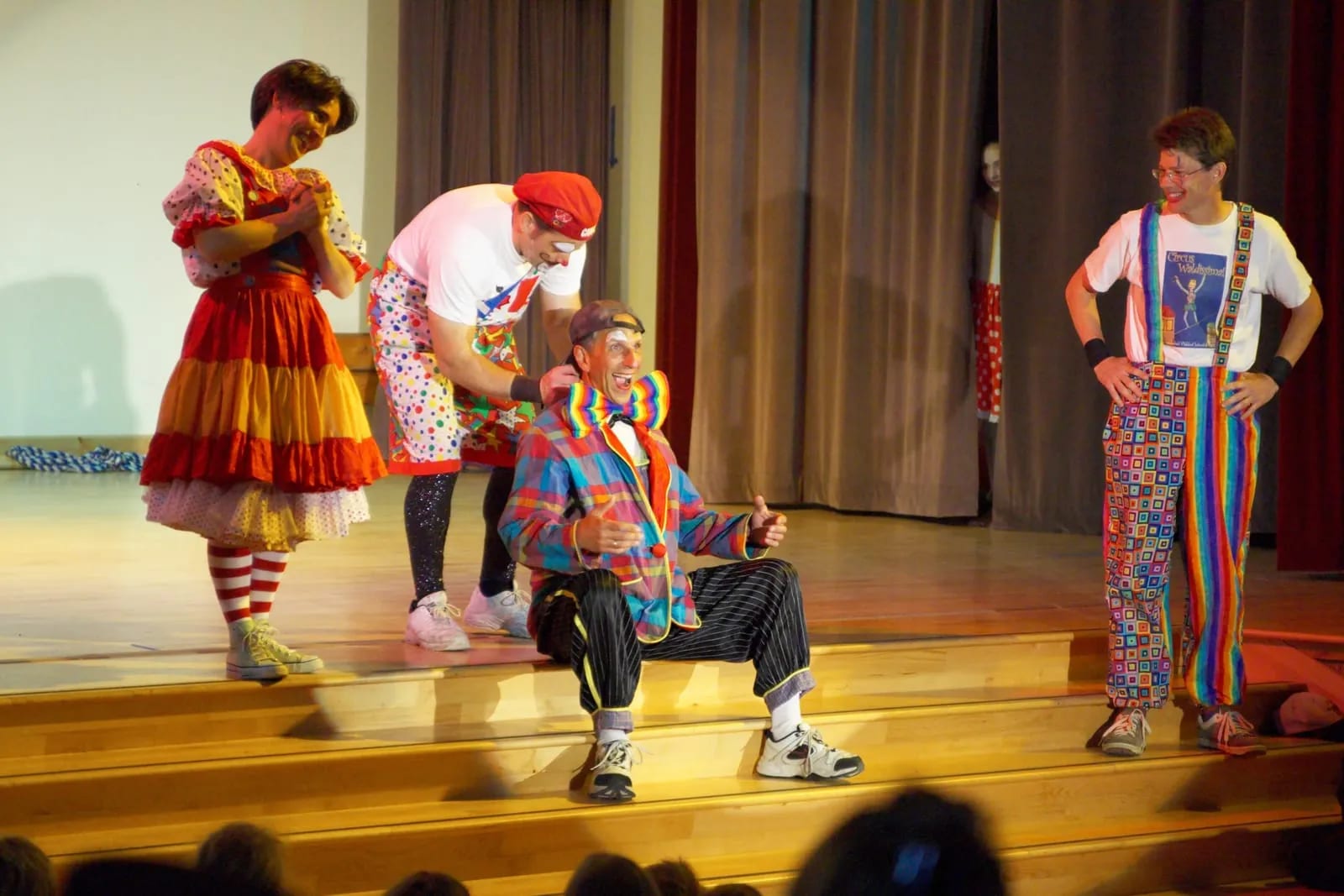 Clowns work the crowd on stage during a Circus Waldissima show.