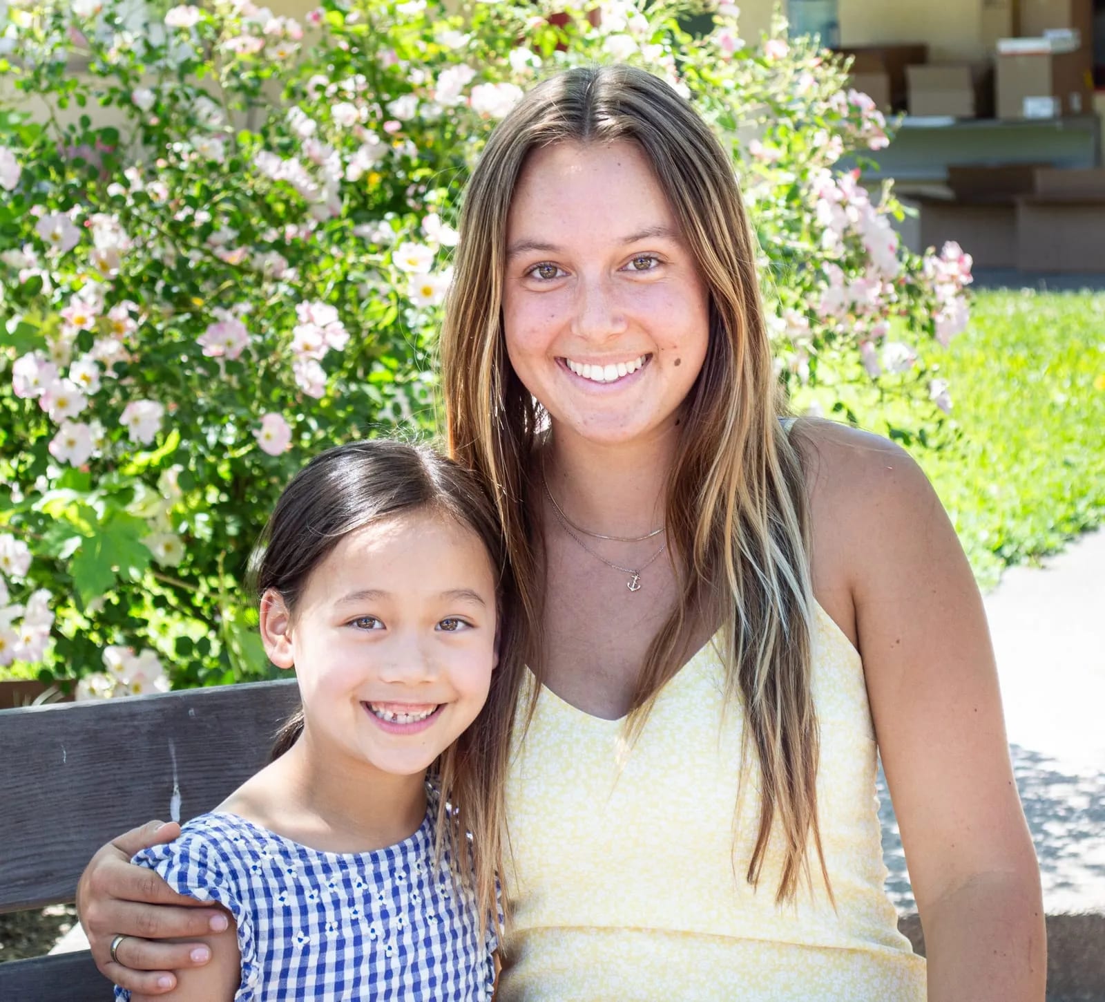 A high schooler and her first-grade buddy.